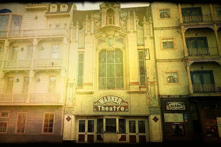 Vintage-style image of the ornate facade of the Warner Theatre building in Atlantic City